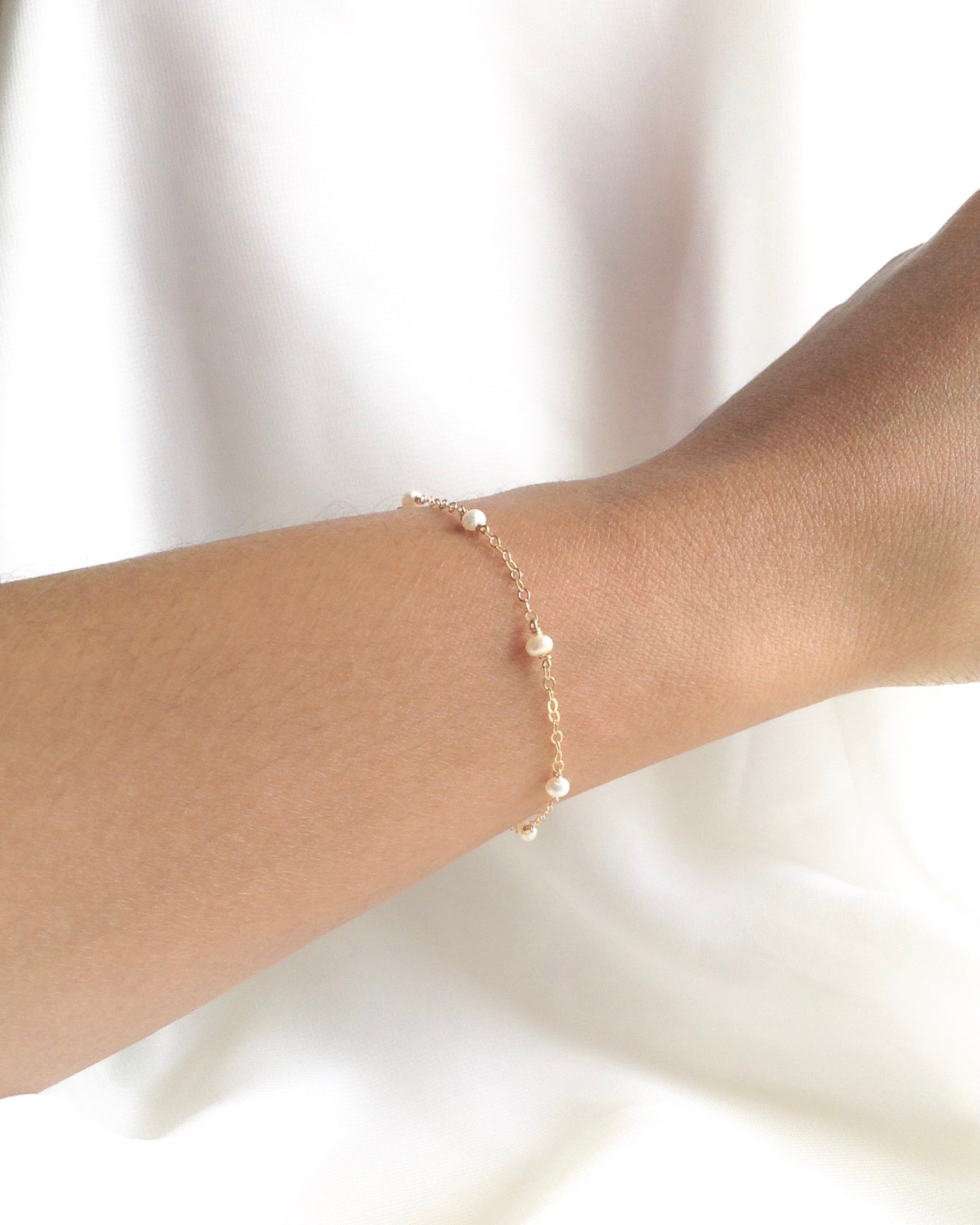 Small gold pearl outlets bracelet